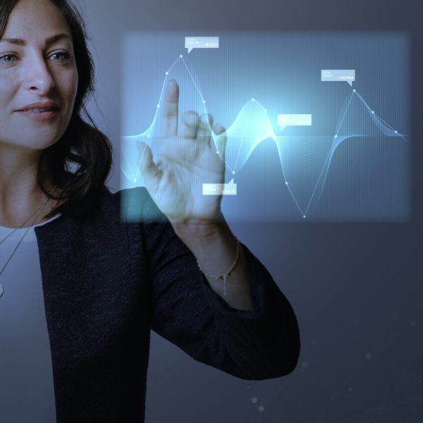 High technology digital graph presentation by a businesswoman